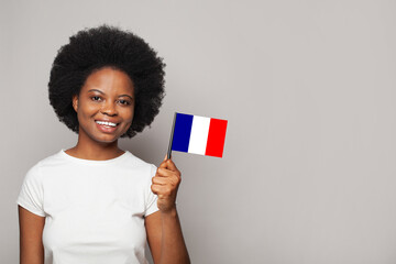 French woman holding flag of France Education, business, citizenship and patriotism concept