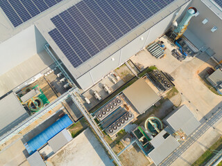 Aerial top view of industry factory, ventilation fan cooling motorized stainless steel power units,...