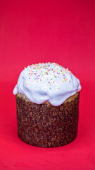 one Easter cake on a red isolated background