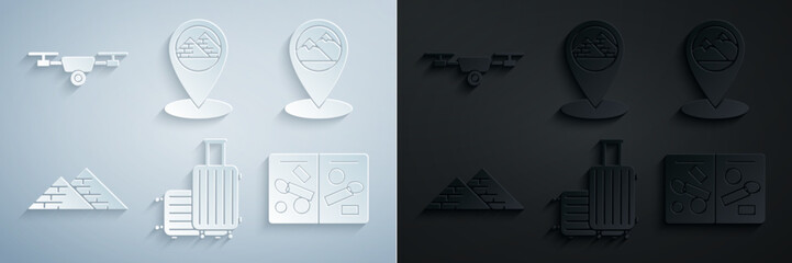 Set Suitcase for travel, Map pointer with mountain, Egypt pyramids, Passport pages visa stamps, and Drone flying action video camera icon. Vector