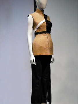 Martin Margiela. Ready-to-wear, spring summer 1997. Sectional study of drapery mounted on a structure. Vest, jeans.