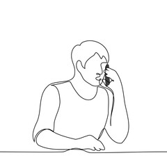 man talking on the phone sitting at the table - one line drawing vector. the concept phone conversation