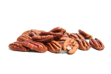 Peeled pecan nuts isolated on a white background. Heap of pecan halves