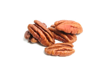 Peeled pecan nuts isolated on a white background. Heap of pecan halves