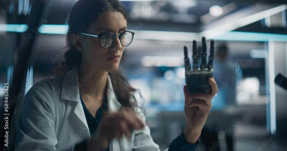 Poster Young Scientist Working on a Bionic Robot Hand for People with Health Conditions or Impairments. Female Engineer Using a Screwdriver to Work on Humanoid AI Robot Component at a Startup Company