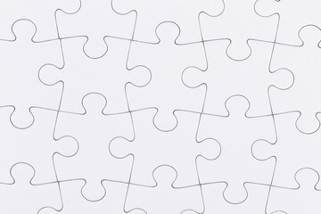 Fototapeta premium white puzzle jigsaw close up