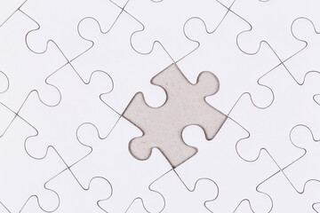 white puzzle jigsaw close up