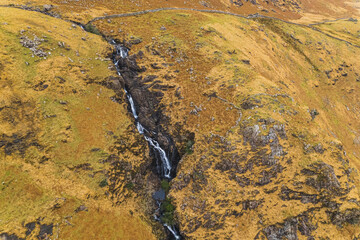 Mountain river at Snowdonia national park in Wales, top aerial view. High quality photo