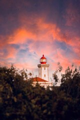 Lighthouse against a sunset