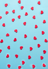 Red heart on the blue background Valentines day pattern background flat lay, top view
