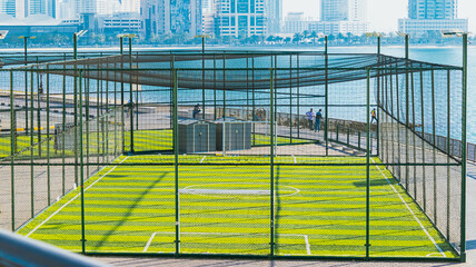 fenced football field in the city