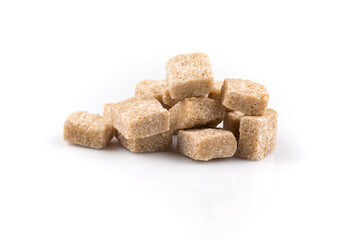 Heap brown sugar cubes isolated