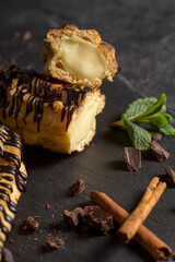 Fresh-baked eclair filled with delicious custard