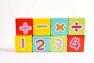 Number wood block cubes for learning Mathematic, education math concept.