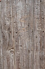 weathered wooden boards with rusty nails