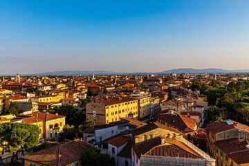 Fototapeta na wymiar Beautiful cityscape at sunset in Pisa, Province of Pisa, Italy