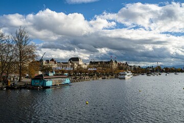 Beautiful shot of historic buildings across water in Zurich, Switzerland