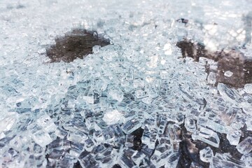 Macro of safety glass shards lying on the ground