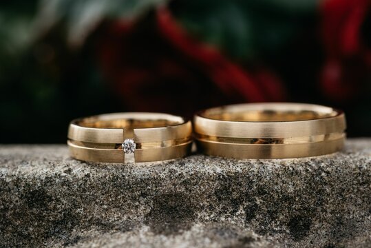 Closeup of two golden wedding rings