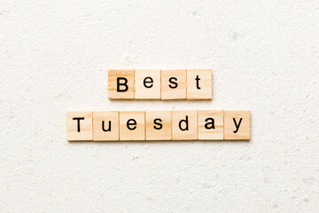 best Tuesday word written on wood block. best Tuesday text on cement table for your desing, concept