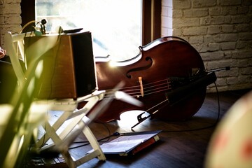 Selective focus shot of a stage with a cello