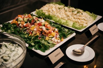 Selective focus shot of plated with delicious salad at an event
