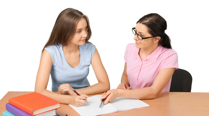 Fototapeta premium Mother helping happy daughter with homework on background