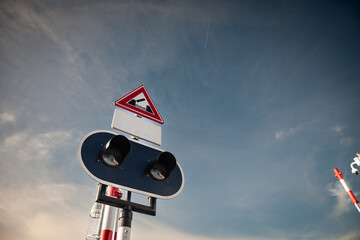 Selective blur on a traffic light and a european roadsign indicating a lift bridge, also called...