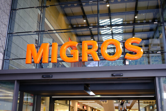 INTERLAKEN, SWITZERLAND - SEPTEMBER 04, 2022: Migros sign at the entrance of Store. Migros is a famous biggest retail and wholesale company in Switzerland.