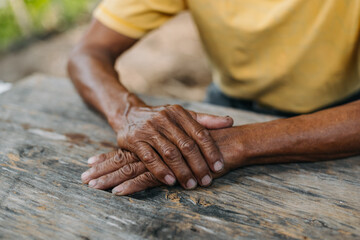 Close up of male wrinkled hands, old man is wearing  .. - obrazy, fototapety, plakaty