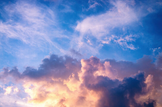 thundercloud, in the rays of the sun, colorful beautiful sky background