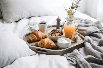 Fototapeta na wymiar French sweet breakfast in a bed, croissants, cereal, coffee, cream. Generative AI