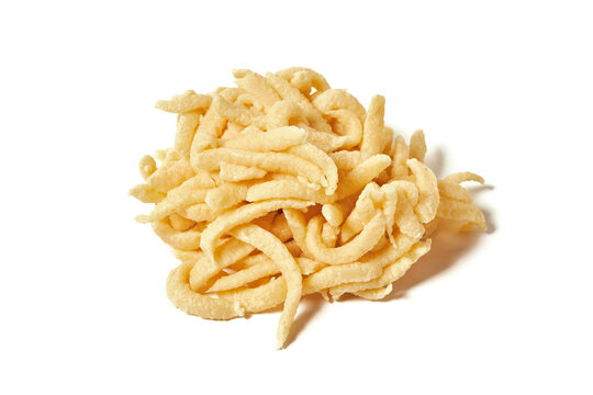 Pile of spaetzle isolated on white background. Homemade german Sp&auml;tzle - gluten free noodle