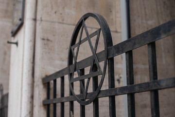 wrought iron gate with The Star of David - symbol of Jewish Community. Judaism confession and religion. 