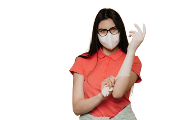 Young girl in surgical mask and glasses, wearing in a pink t-shirt, putting on protective gloves, looks confident, protection against coronavirus pandemic, quarantine at home. transparent background