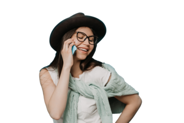 Adorable young brunette girl dressed in white t-shirt, brown hat and knitted sweater tied around her neck, makes video call to see friends during pandemic. Stay safe. transparent background