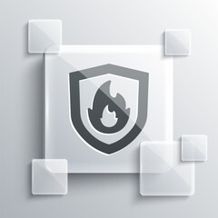 Grey Fire protection shield icon isolated on grey background. Insurance concept. Security, safety, protection, protect concept. Square glass panels. Vector