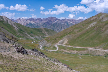 High mountain pass and mountains peaks, Tuluk valley, Naryn region, Kyrgyzstan