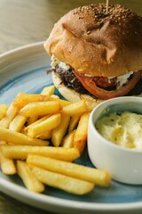 very tasty burger with french fries