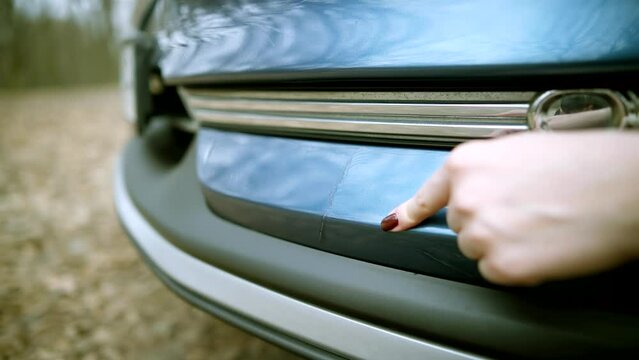 Car bumper damage scratches . Paint deformation on car