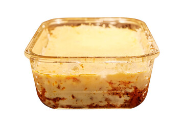 Process of baking cheese lasagna, isolated on a white background. Cooking Italian dinner in a glass container, isolated on a white background. Lasagna in the oven, close-up.