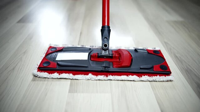 Woman cleaning floor wet mop 