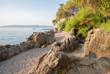 bathing beach at the seaside Moscenicka Draga, in the morning sun