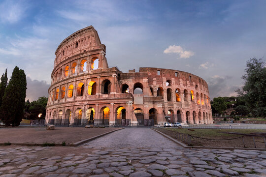 View of the Colosseum at sunset, a famous landmark from Roman Empire, Rome, Lazio, Italy.