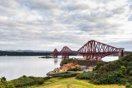 View of Forth Bridge crossing the bay in North Queensferry, Edinburgh, Scotland, United Kingdom.
