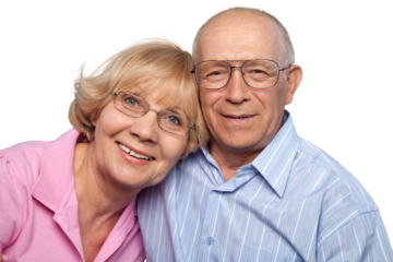 Portrait of happy senior couple smiling at home