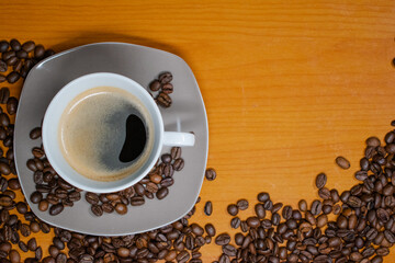 Morning coffee with coffee beans in the picture