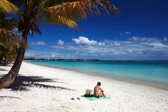Girl on beach, Trou Aux Biches, Mauritius, Indian Ocean