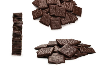 Dark chocolate candies isolated on white background.