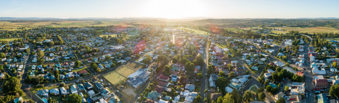 Panorama of sunset over town of Singleton with view down highway